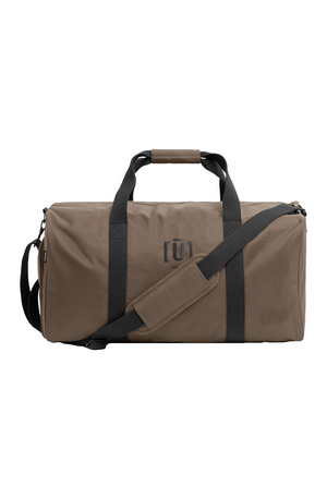 Brown bag with black straps on a white background